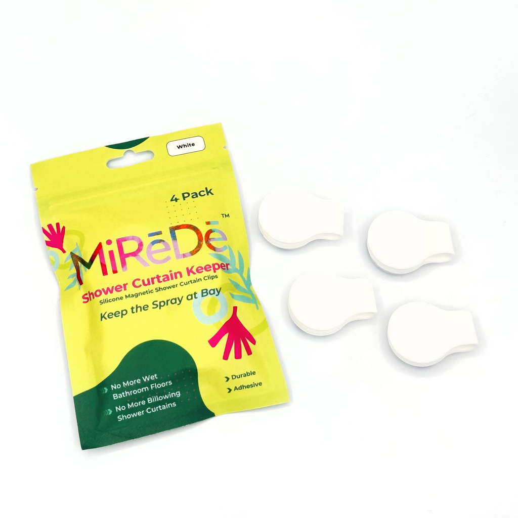 Yellow package of MiReDe shower curtain keepers with white clips on a white background